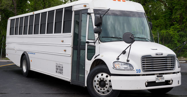 exterior image of white shuttle bus in Bel Air, MD